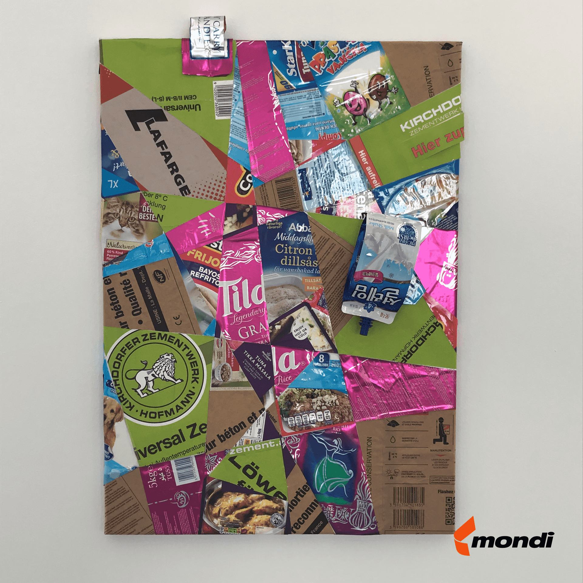 Colorful piece of cardboard with various color fragments, presented in the context of digital art on the CANCOM smART Walk.