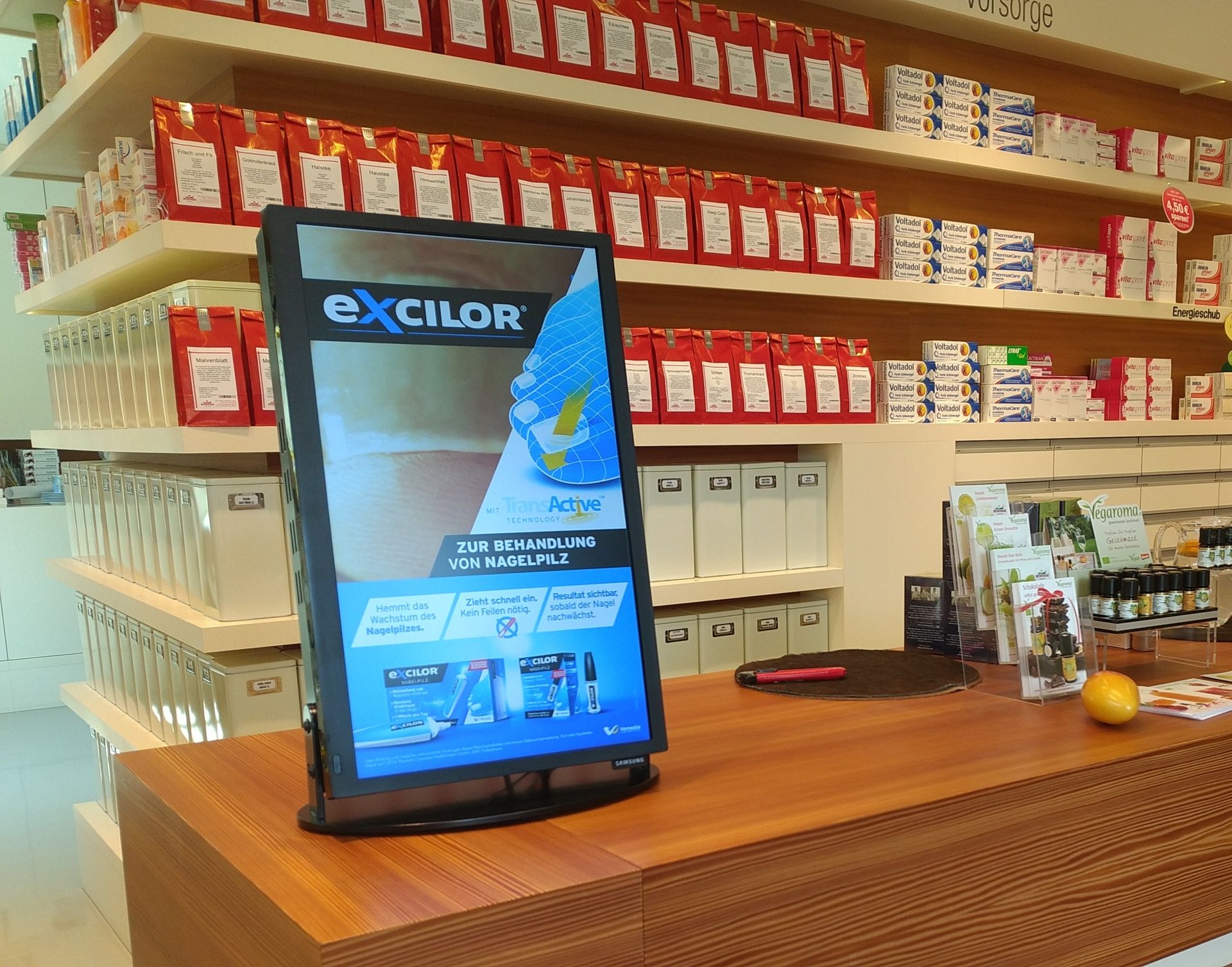 Display of a computer on a counter in a store.